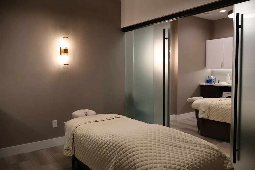 Two massage rooms at The Bluffs Med Spa in Bluffton, South Carolina, ready for a couples session
